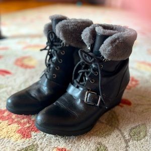 Women’s black leather UGG boots